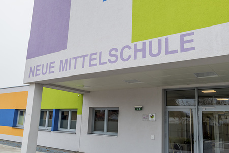Neue Mittelschule, Symbol für Bildung und  Schulreform
