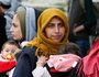 Flüchtlinge am 19. Oktober 2015 im Transitlager nahe dem griechischen Idomeni an der mazedonischen Grenze. Bild: Frauen mit Kindern.