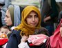 Flüchtlinge am 19. Oktober 2015 im Transitlager nahe dem griechischen Idomeni an der mazedonischen Grenze. Bild: Frauen mit Kindern.
