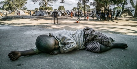 Trip of CRTN to Mozambique, September 2021At the IDP camp in Metuge district (a district of Cabo Delgado Province in northern Mozambique)Photo: Sleeping child on the earth