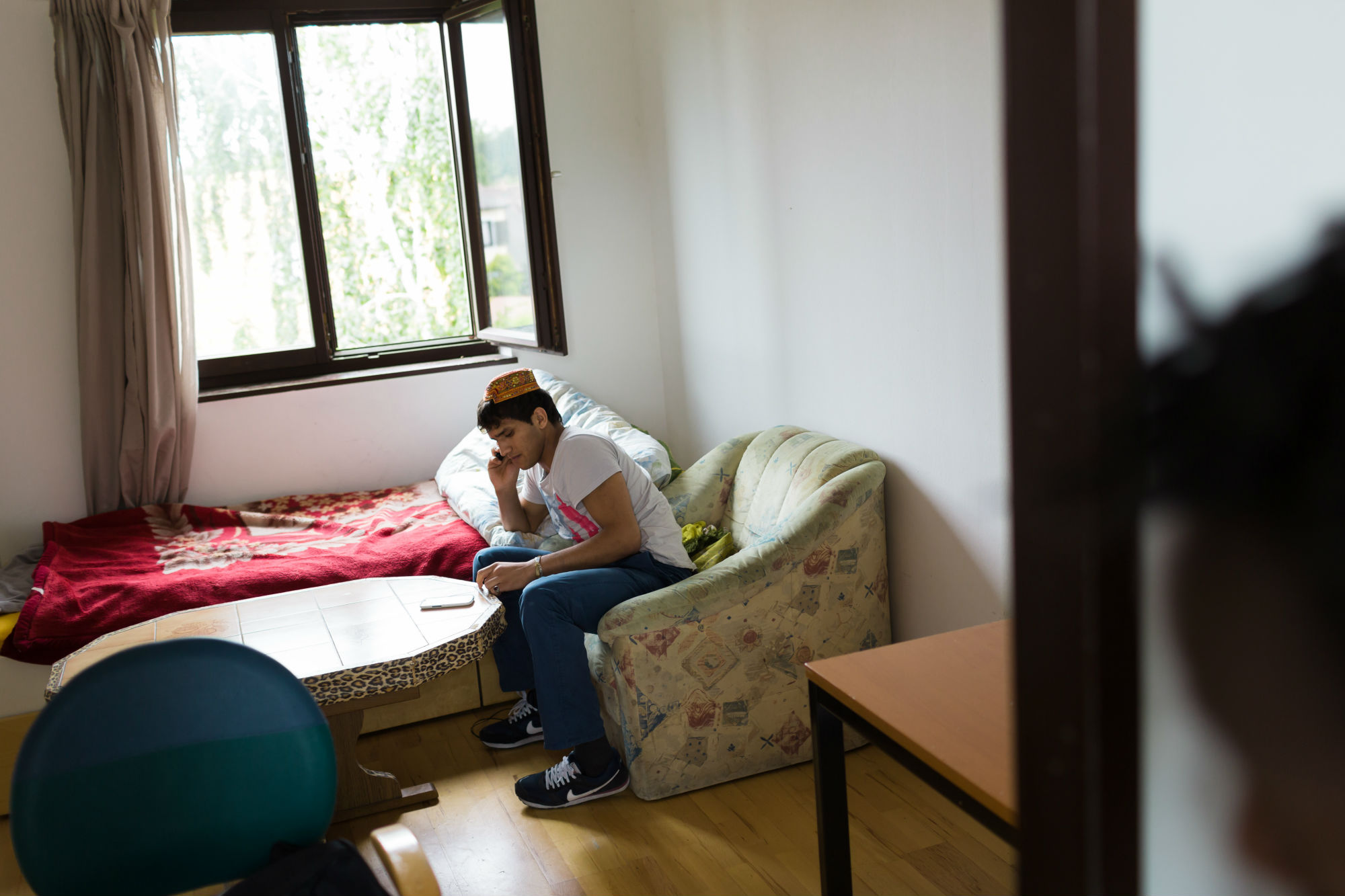 Junger Flüchtling im Flüchtlingsheim Don Bosco / Flüchtlingswerk Junger Flüchtling im Flüchtlingsheim Don Bosco