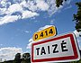 Ortseingangsschild der französischen Stadt Taize.