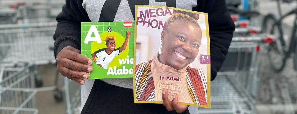 Zeitschrift Megaphon mit Beilage / Zakary Graz: Caritas-Straßenmagazin verkauft WM-Kinderbuch mit Alaba & Co.